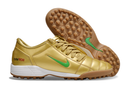Chuteira NIKE TOTAL 90 Society Dourado com verde