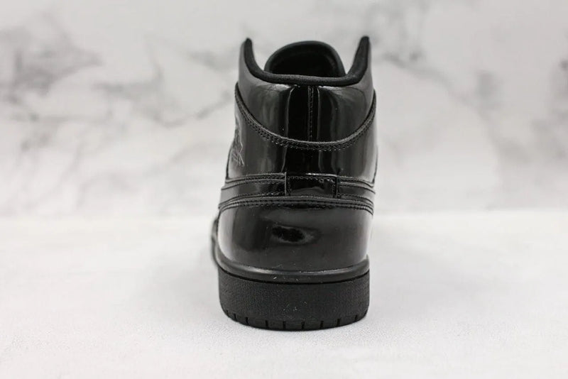 AIR JORDAN 1 MID SE TRIPLE BLACK PATENT WOMAN